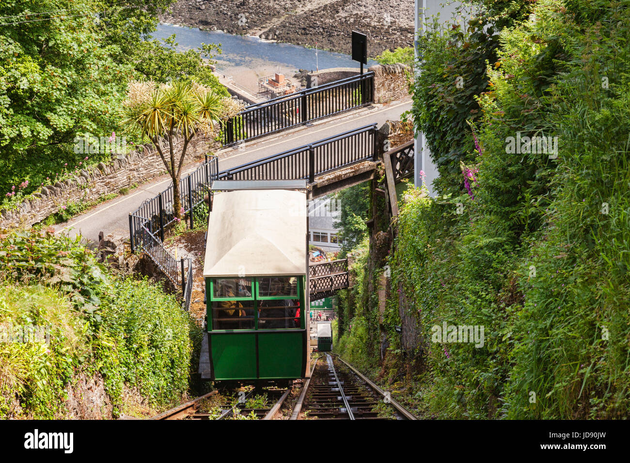 12 June 2017: Lynton, Devon, England, UK - The two cars of the Lynton and Lynmouth Cliff Railway approach one another on the steep track between the t Stock Photo
