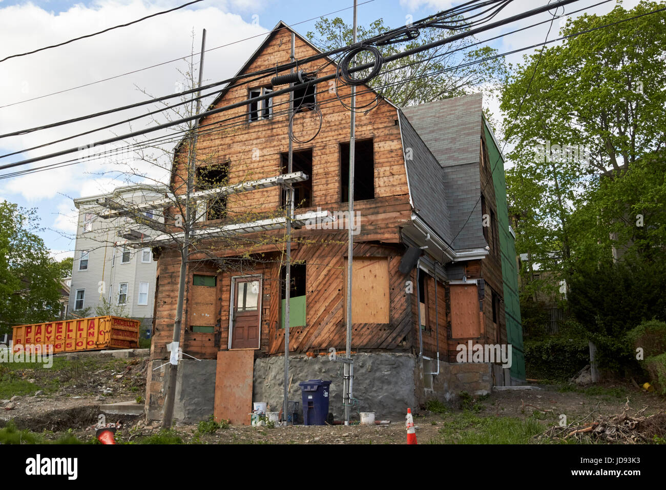 building preservation work ongoing on wooden three storey house savin hill dorchester Boston USA Stock Photo