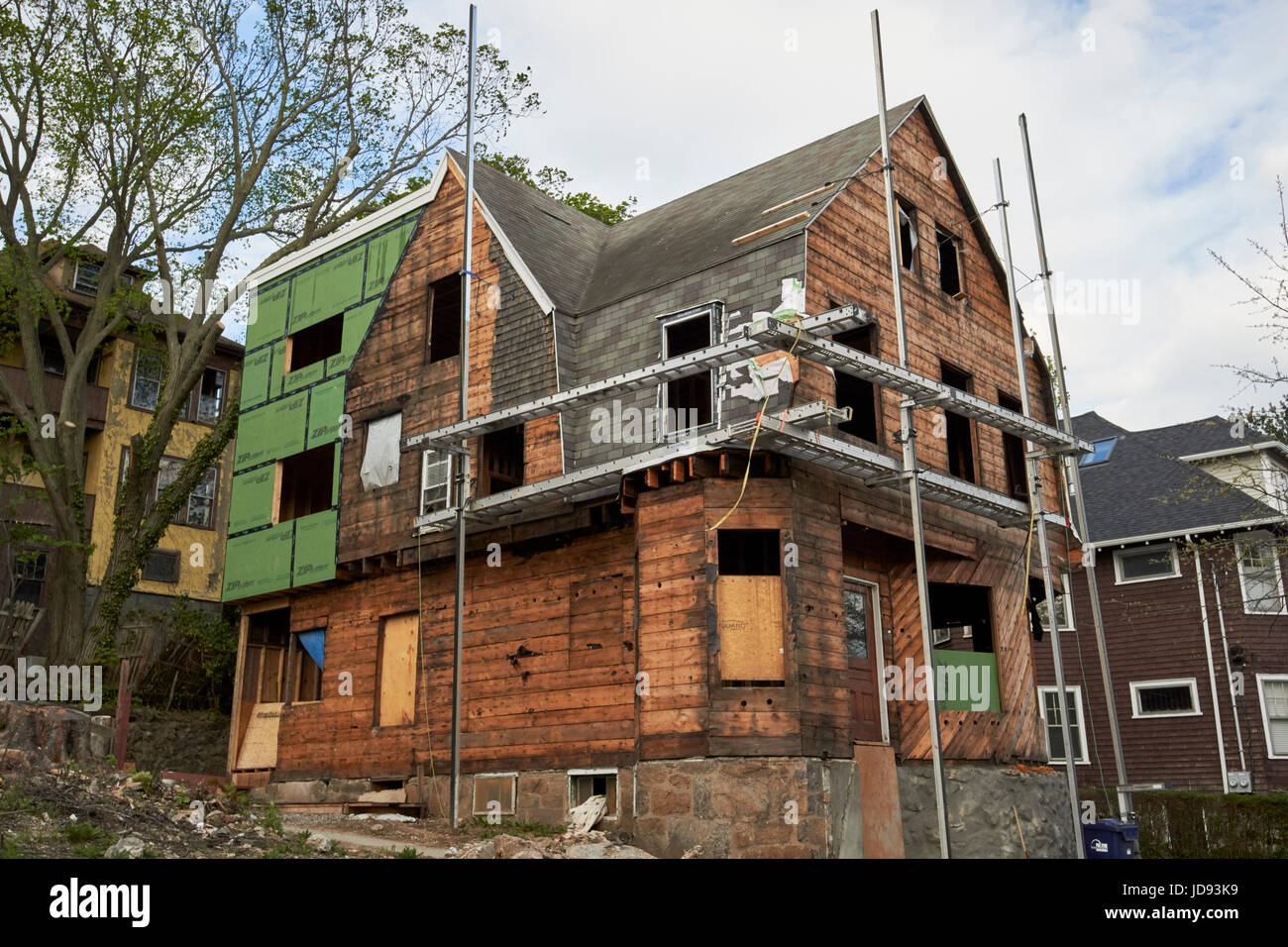 building preservation work ongoing on wooden three storey house savin hill dorchester Boston USA Stock Photo