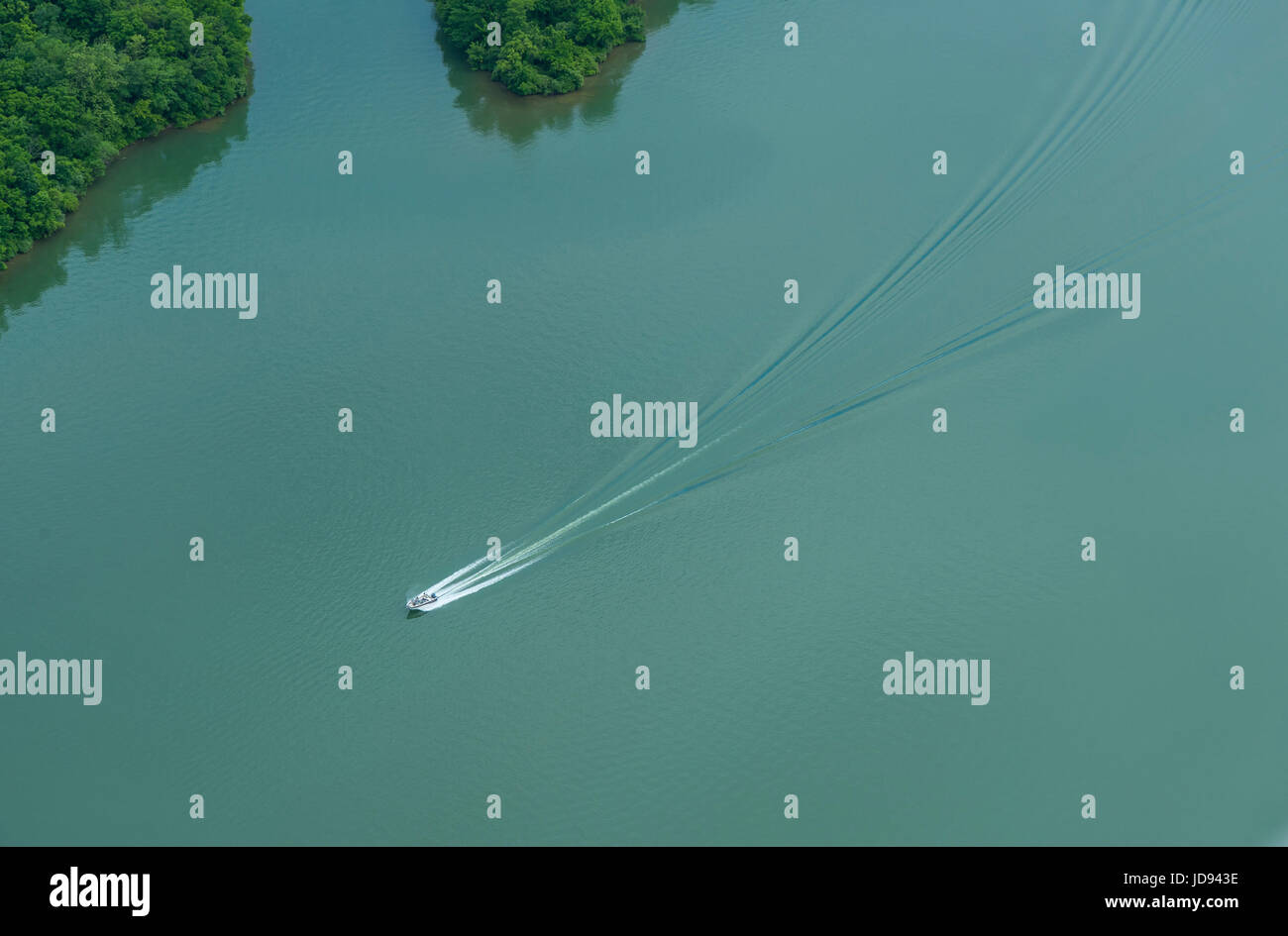 Aerial View Of Speedboat Speeding In Lake Stock Photo