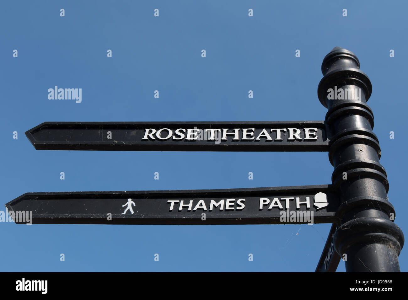 signpost showing directions to the thames path and rose theatre, in