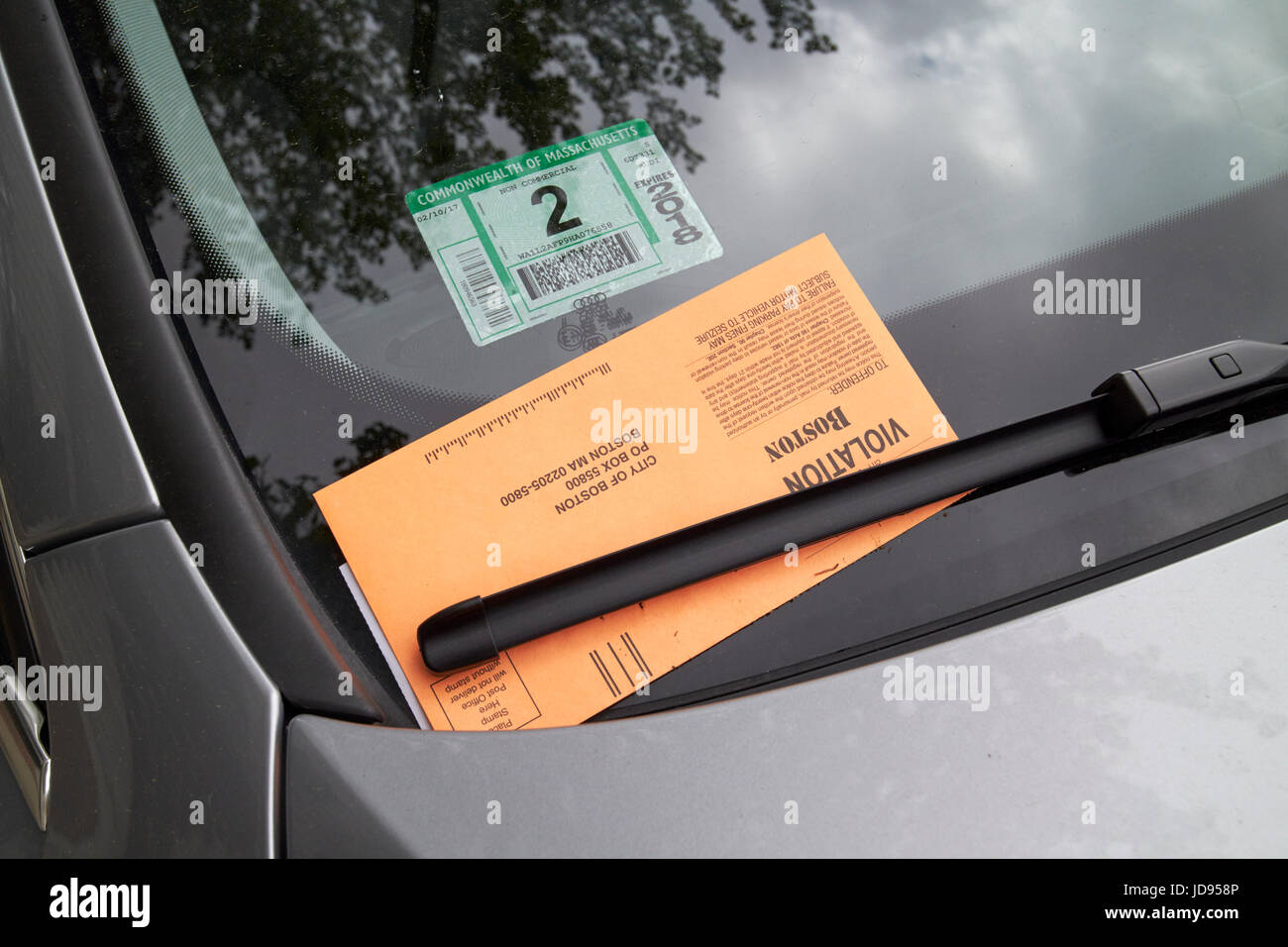 city of boston parking violation notice under windscreen wiper Boston USA Stock Photo