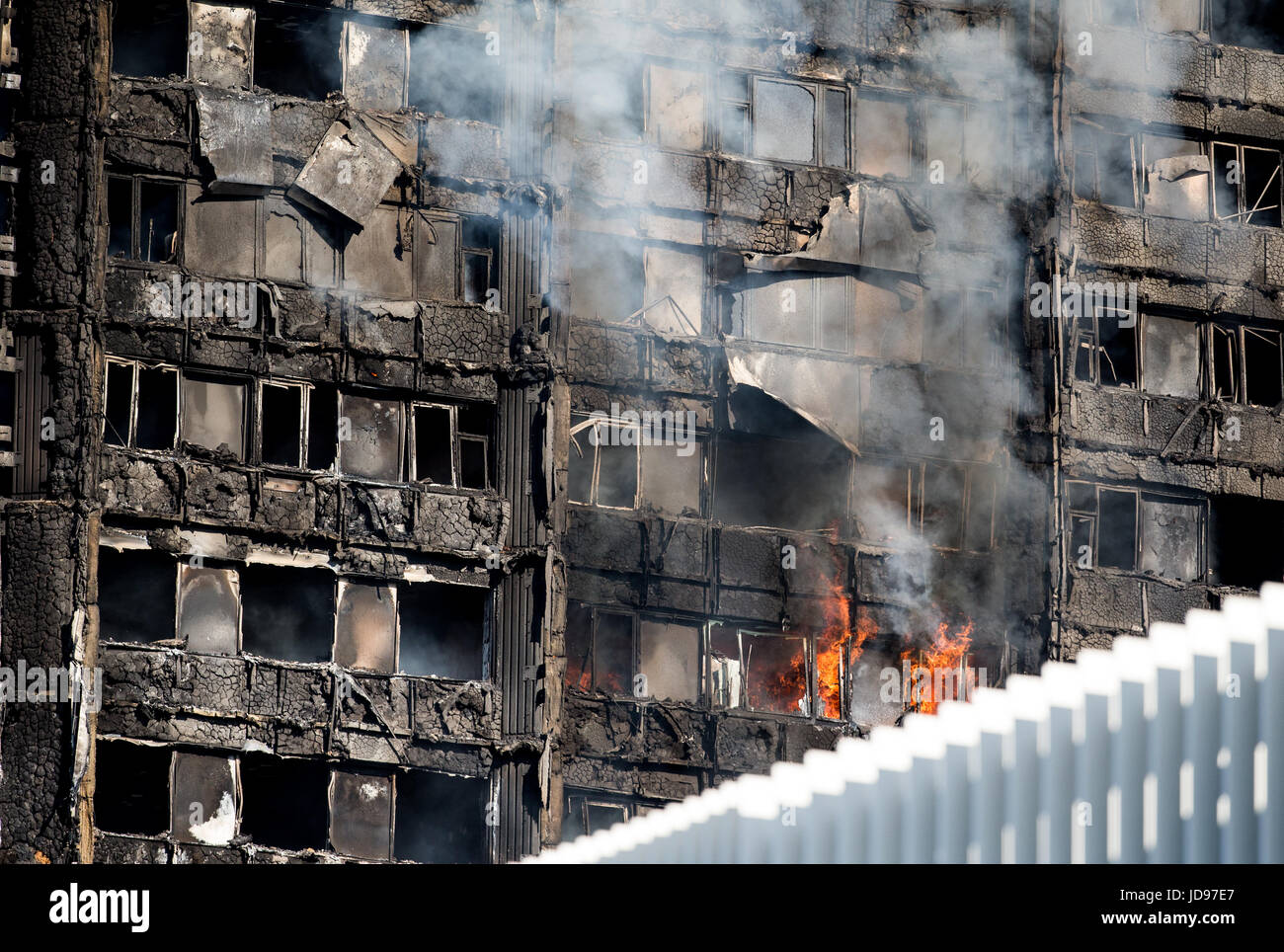 Fire burns at Grenfell Tower in Latimer road, London.The fire stared on the 4th floor when a fridge caught fire. There have been multiple casualties Stock Photo