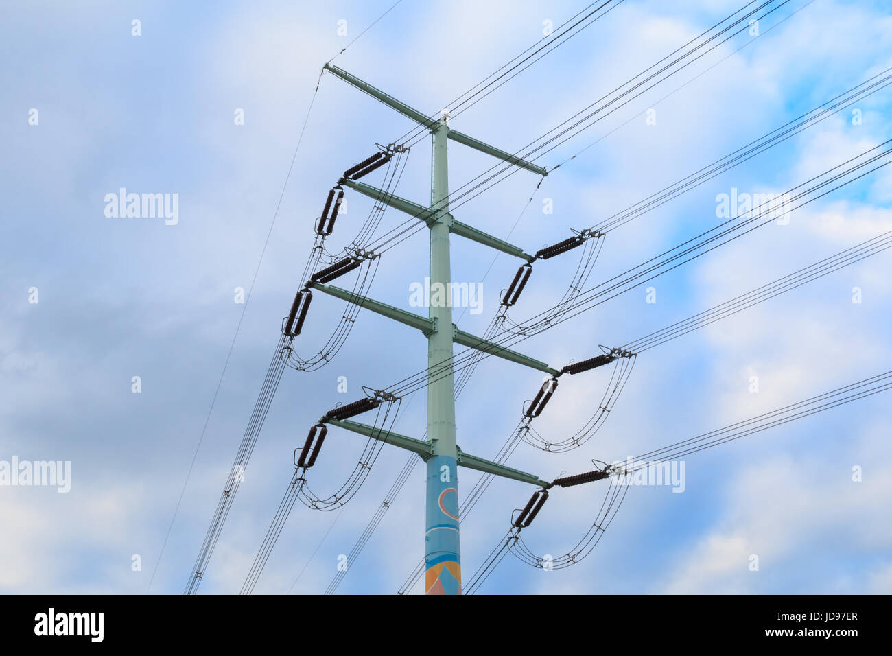 Utility poles supporting wires for various public utilities Stock Photo