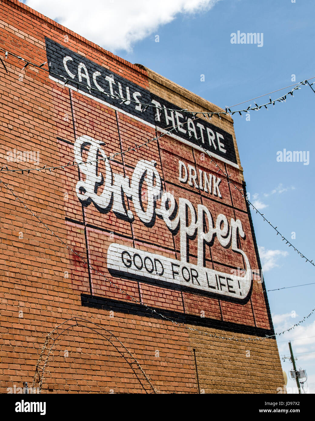 Dr. Pepper advertisement on side of Cactus Theatre building in Lubbock Texas Stock Photo