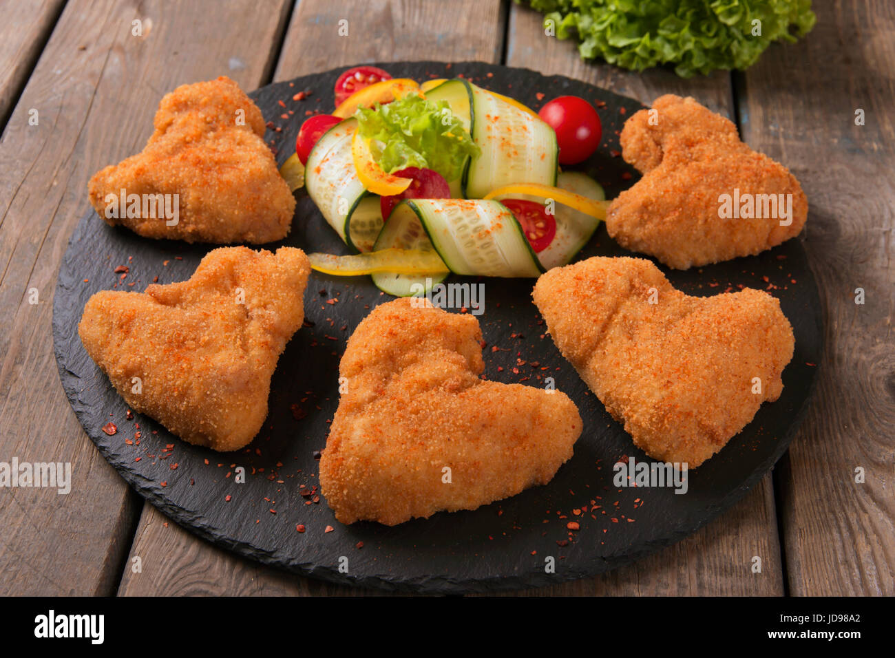 Chicken wings fried in breadcrumbs golden Stock Photo