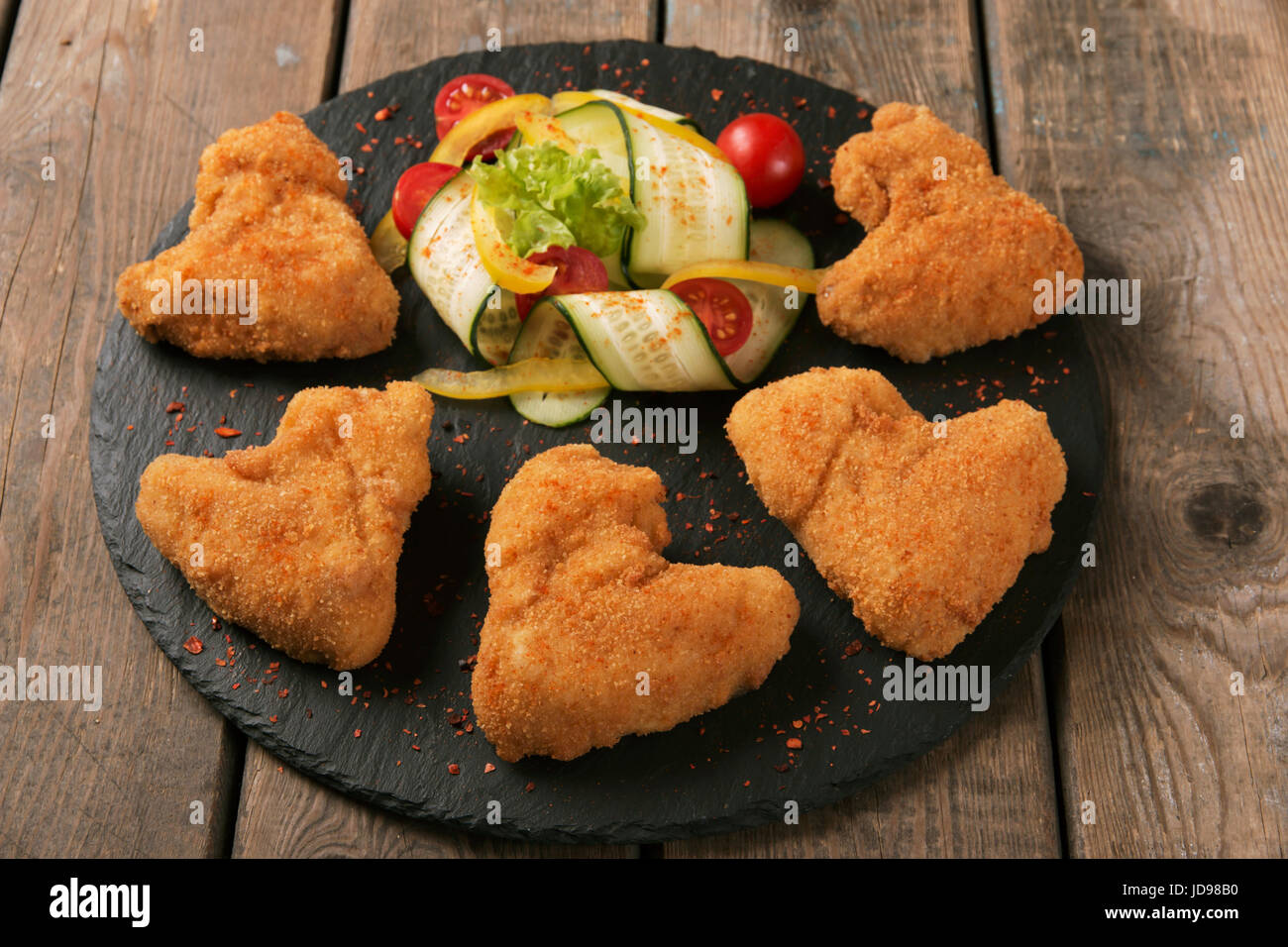 Chicken wings fried in breadcrumbs golden Stock Photo