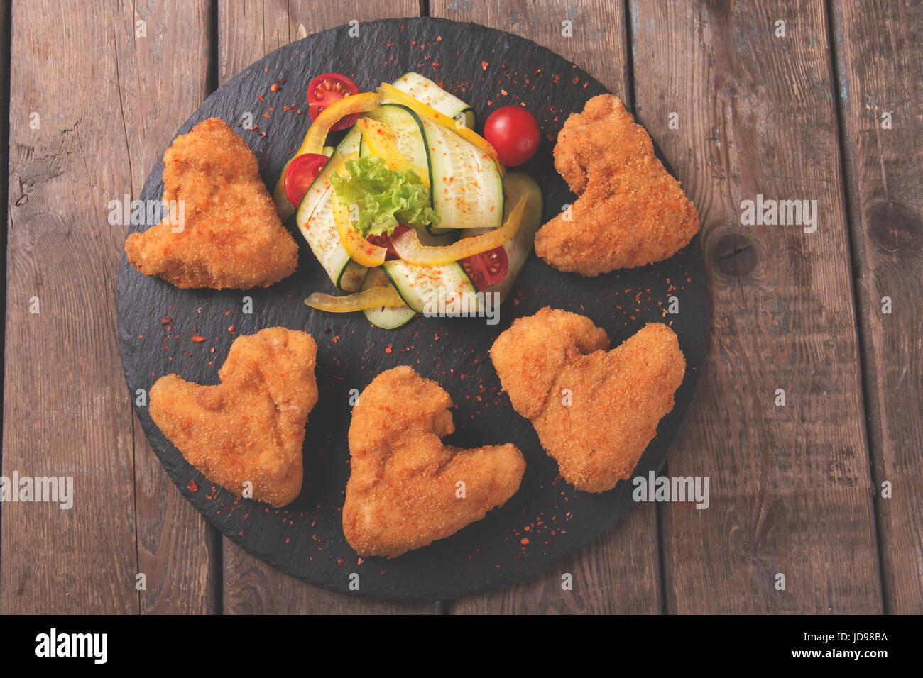 Chicken wings fried in breadcrumbs golden Stock Photo