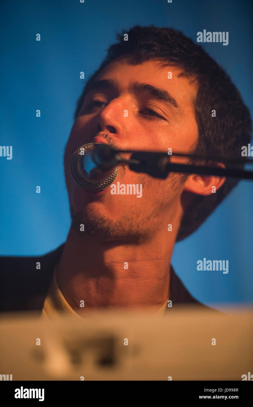 Thornhill, Scotland, UK - August 27, 2016: Nathan Saudi of English post punk band Fat White Family performing at Electric Fields Stock Photo