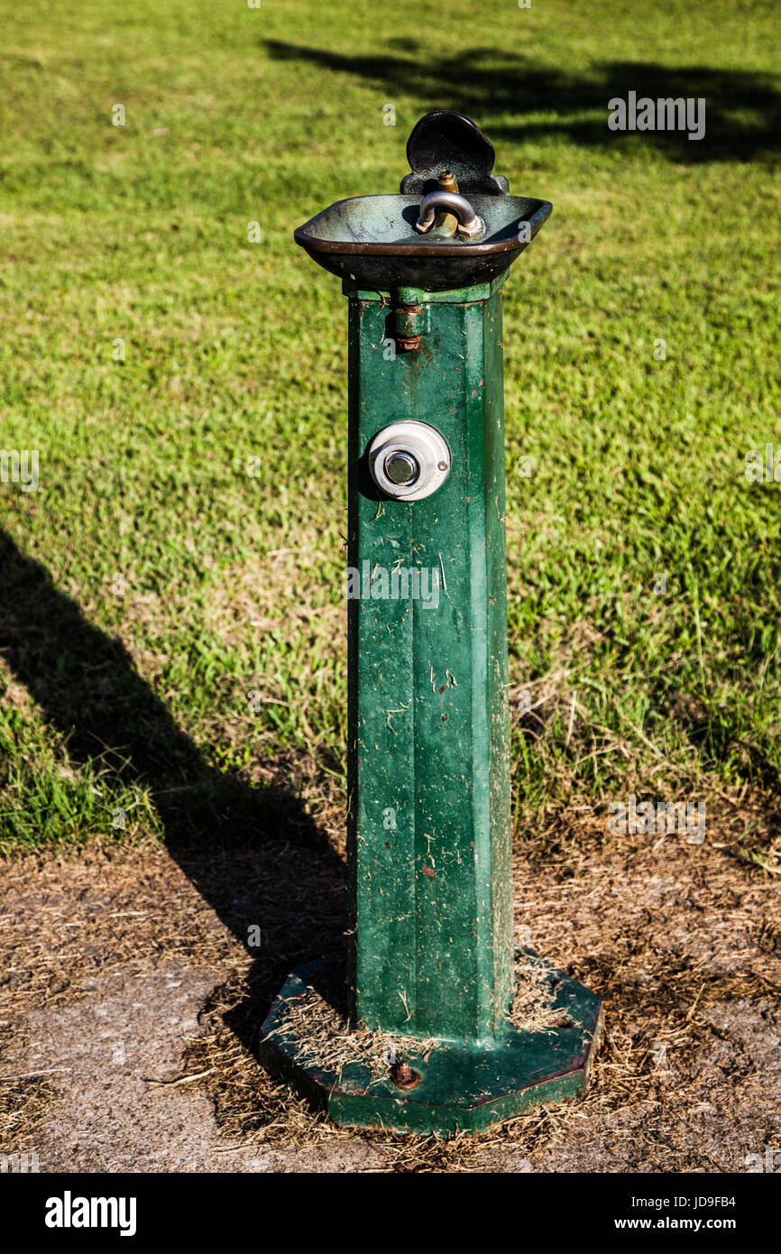 Old Water Fountain. Public park water fountain. Rusty water fountain