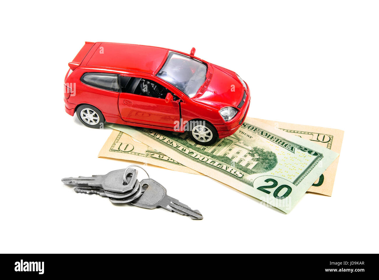 Red toy car with keys and money isolated on white Stock Photo Alamy