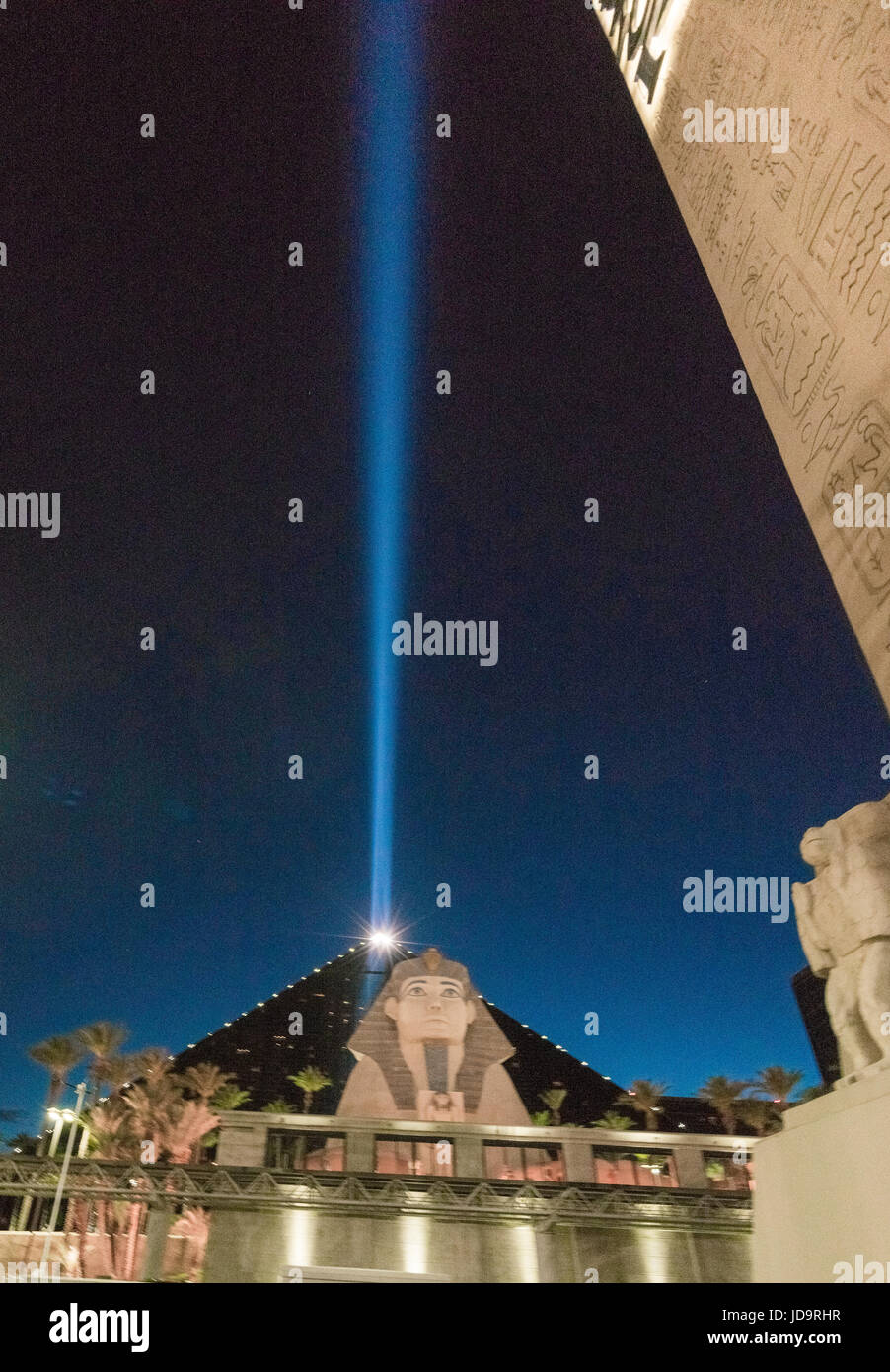 Luxor attraction with sphinx and pyramid, blue laser beam in sky, Las Vegas, Nevada, USA. Stock Photo