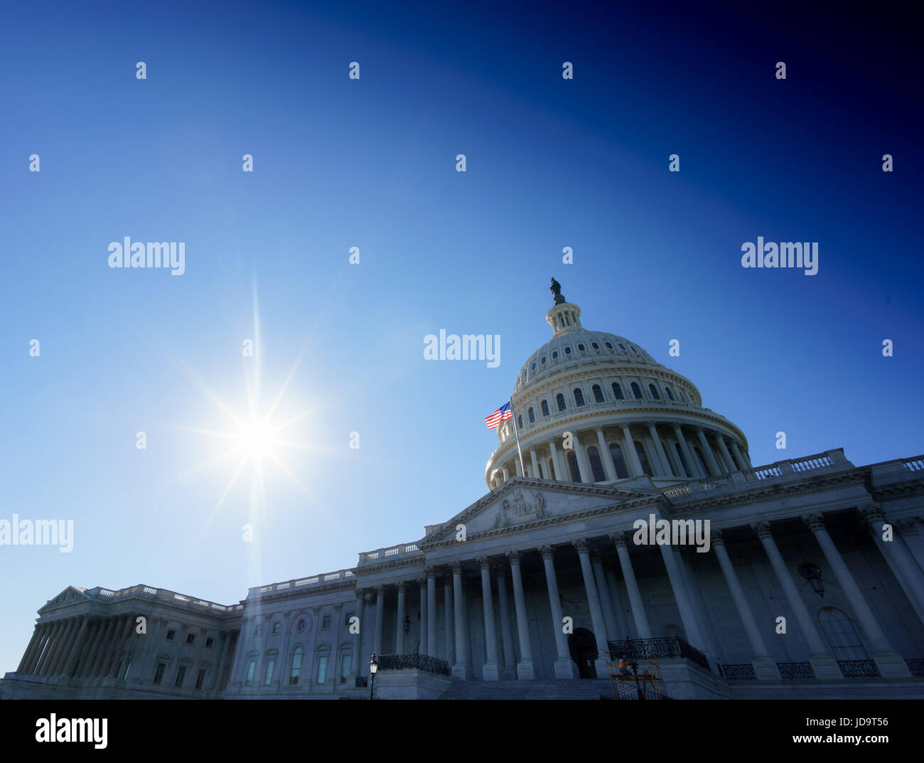 Capitol building exterior against clear blue sky, Washington DC, USA