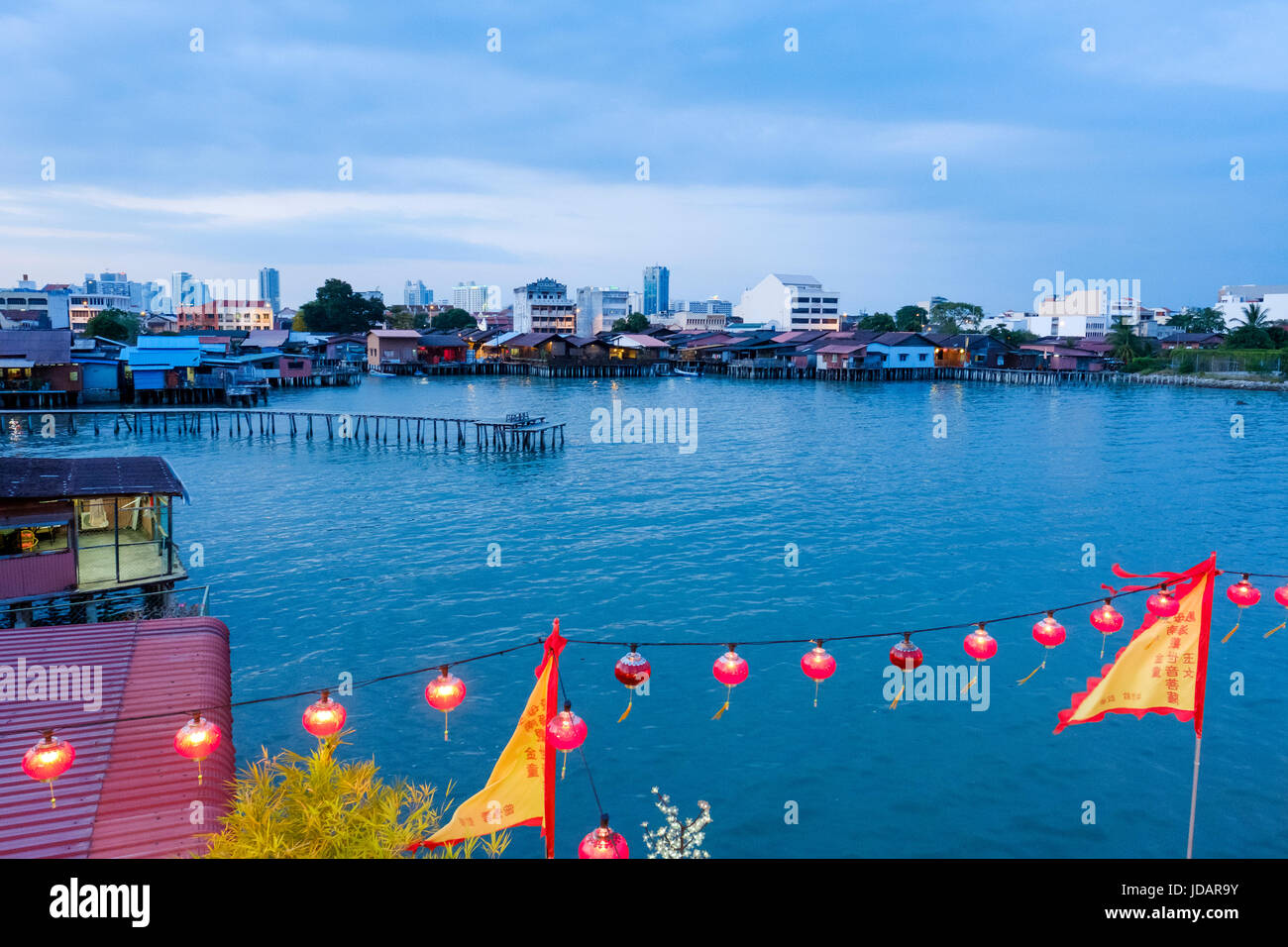 The Clan Jetties of Penang waterfront seen from Hean Boo Thean Temple at dusk, George Town, Malaysia. Stock Photo