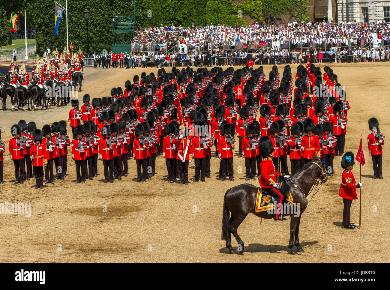 The Irish Guards stand in formation at Trooping The Colour or Queens Birthday Parade at Horse Guards Parade, London ,UK, 2017 Stock Photo
