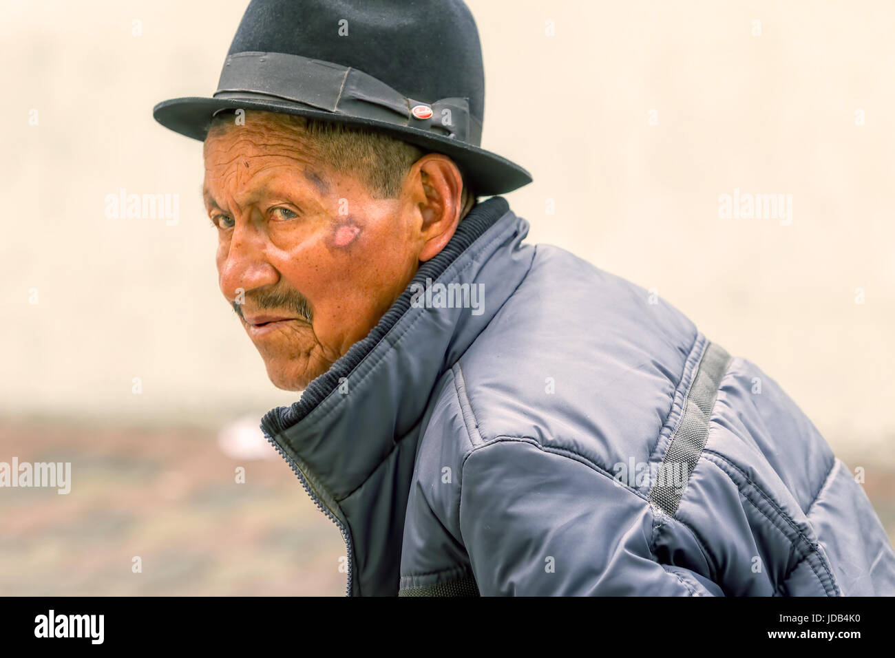 Banos De Agua Santa, Ecuador - 29 November 2014: Portrait Of An Old Indigenous Man On The Streets Of Banos De Agua Santa, South America, Christmas Car Stock Photo