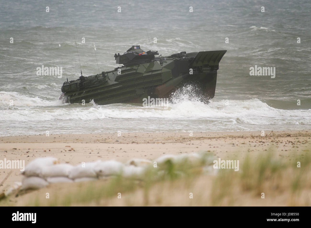 An American Assault Amphibious Vehicle AAV-7 is landing on the beach during the 45th edition of Exercise BALTIC OPERATIONS  BALTOPS 2017 in Ustka, Pol Stock Photo