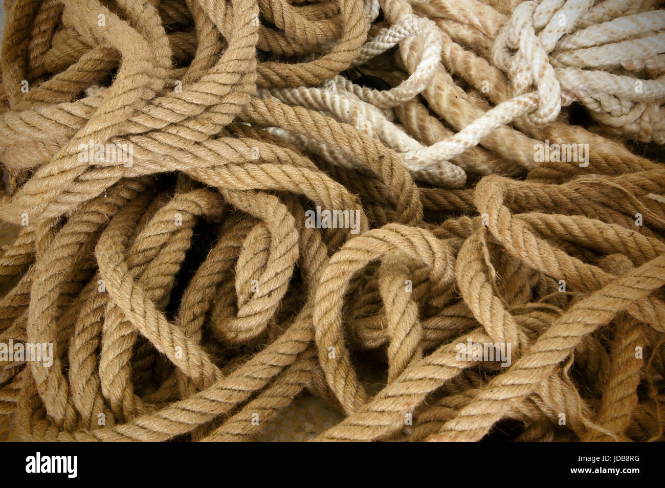A pile of old hemp rope Stock Photo - Alamy