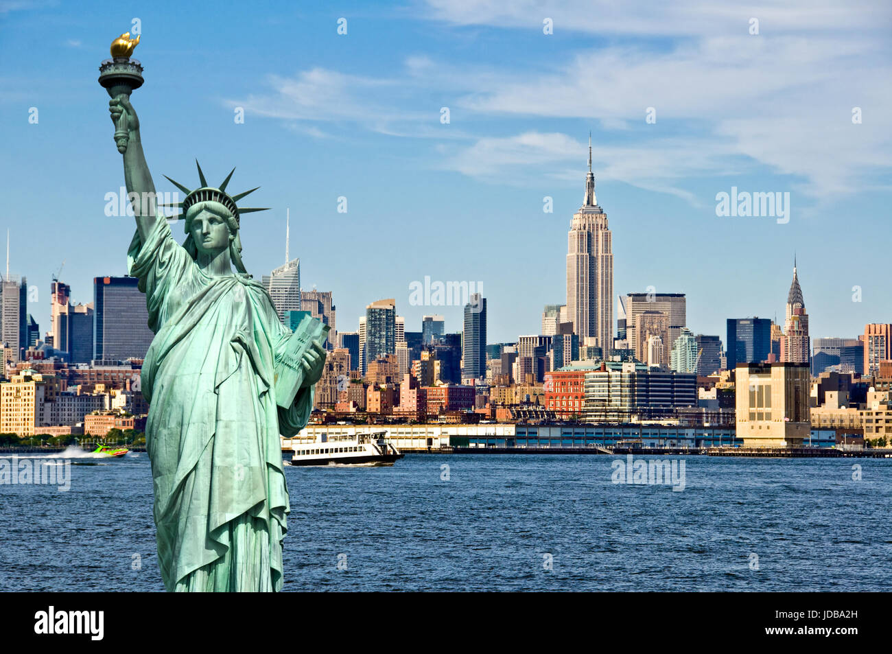 New York skyline and the Statue of Liberty, New York City collage, travel and tourism postcard concept, USA Stock Photo