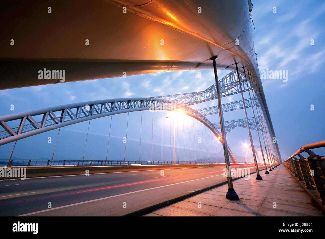 Bridge at night, brightly lit. Stock Photo