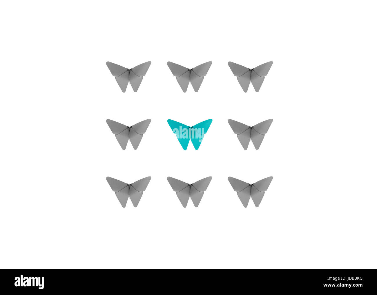 Origami butterflies conceptual background. Stand out from the crowd. Be different. Be unique. Stock Photo
