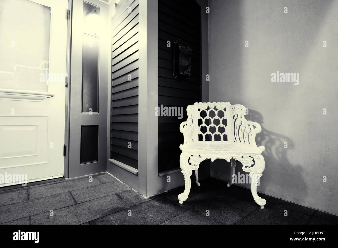 The door at night, under lights and chairs, see the owner Stock Photo Alamy