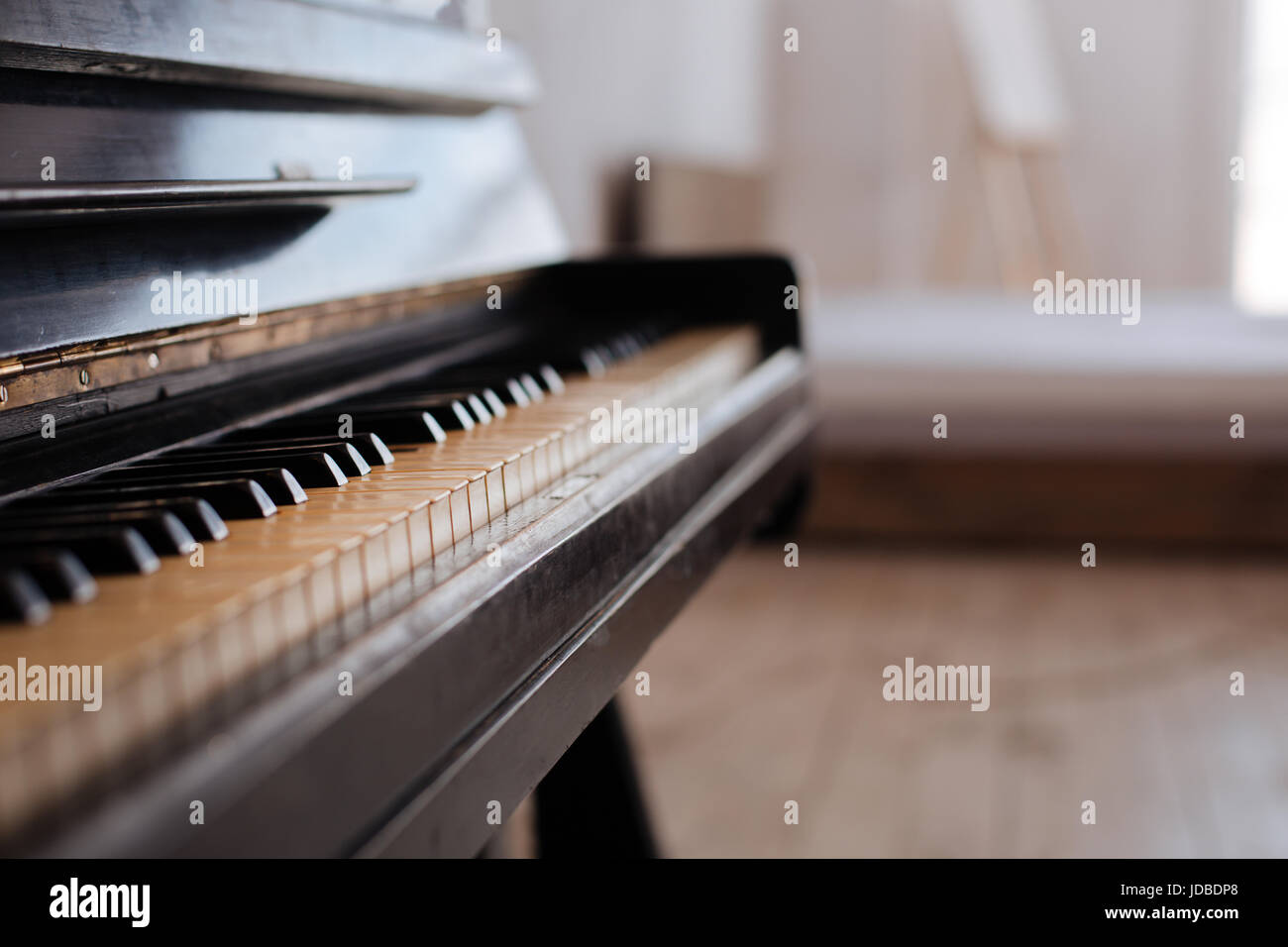 Close up of piano keys and dark wooden grain Stock Photo Alamy