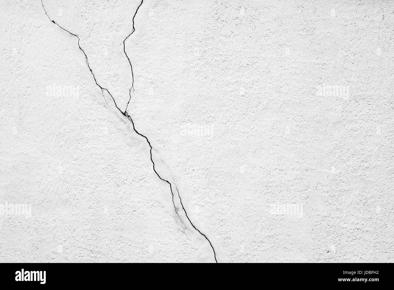 Old cracked concrete wall. Black and white background Stock Photo - Alamy