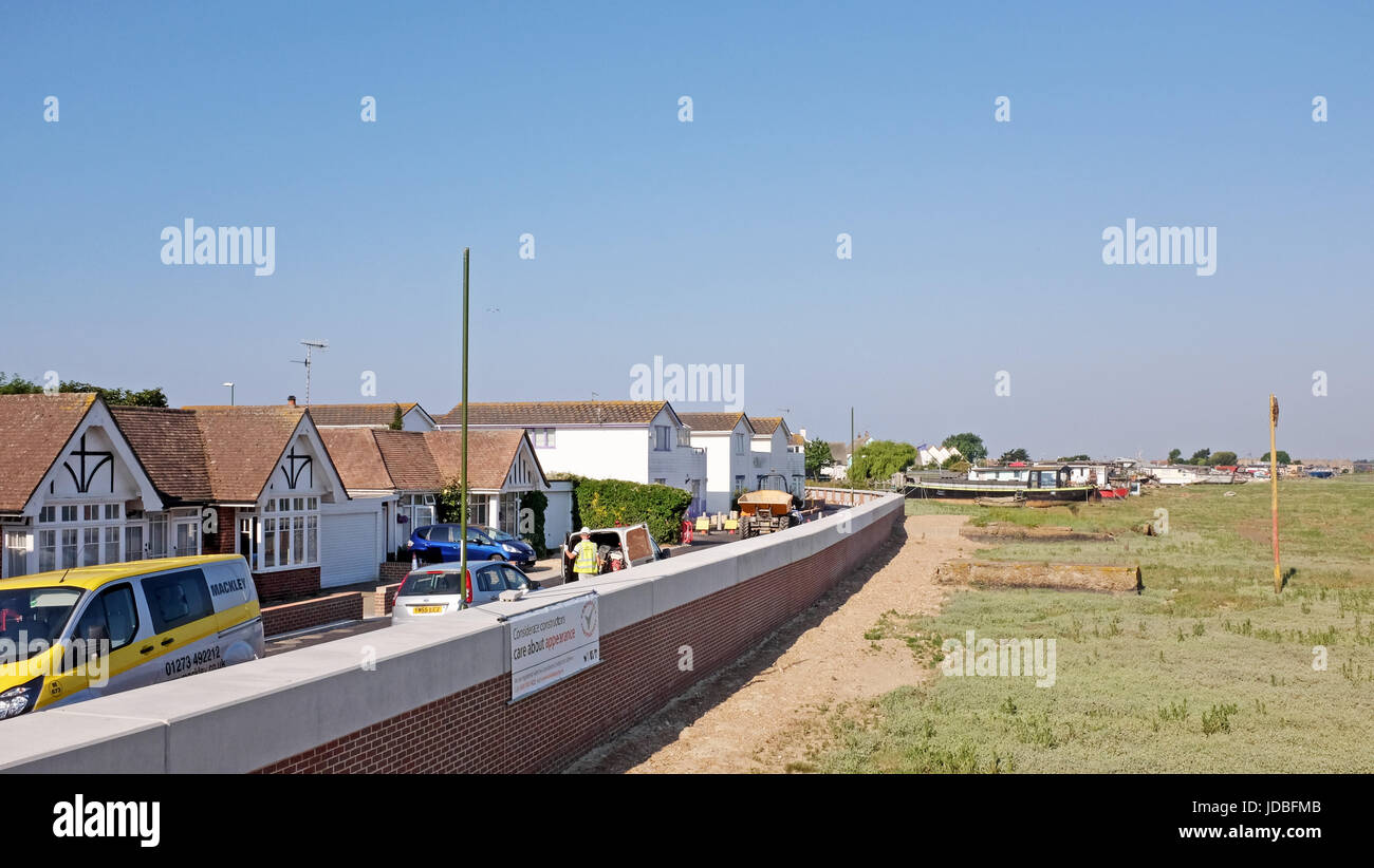 Shoreham Beach Sussex UK - New flood defence wall to protect properties on Shoreham Beach Stock Photo