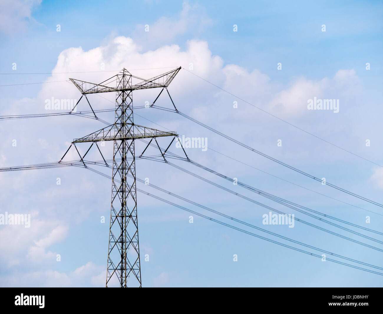 High voltage electric power transmission lines and pylon for electricity transport, Netherlands Stock Photo