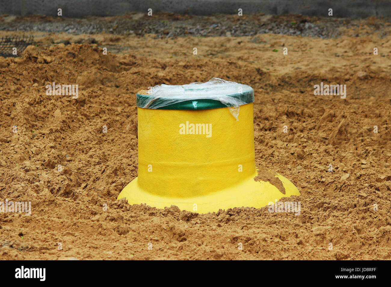 Plastic tank gas oil catcher in the ground during the construction of a car park for tourist buses, Russia Stock Photo