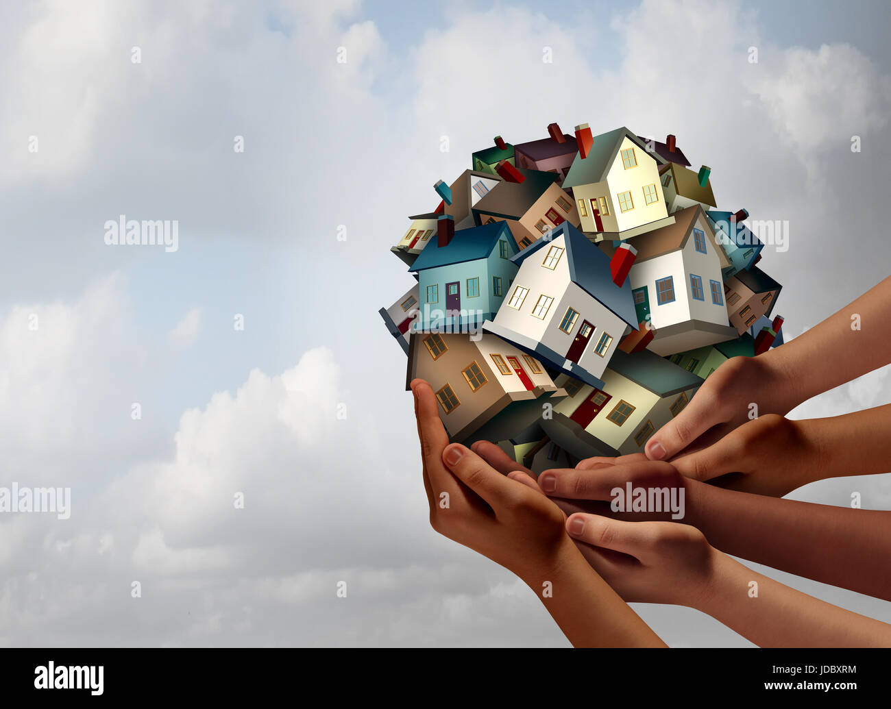 Social housing concept and supportive home ownership symbol as a group of diverse hands holding many family homes as a metaphor. Stock Photo