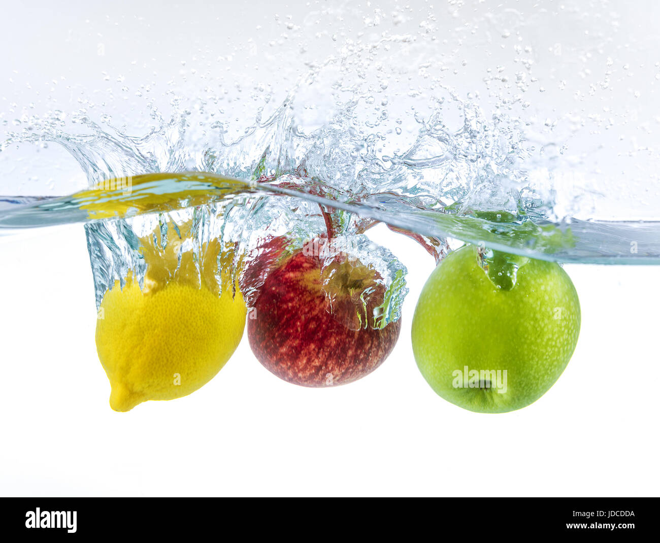 fruits splashing in water Stock Photo Alamy