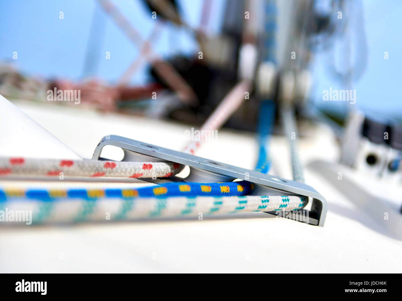 Blocks and ropes on a yacht mast Stock Photo