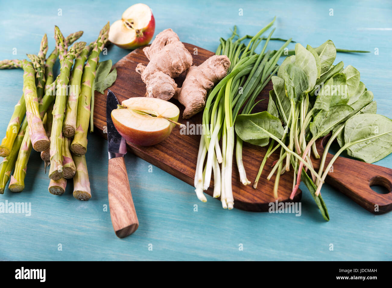 Close-up view of fresh seasonal vegetables on wooden table top texture Stock Photo