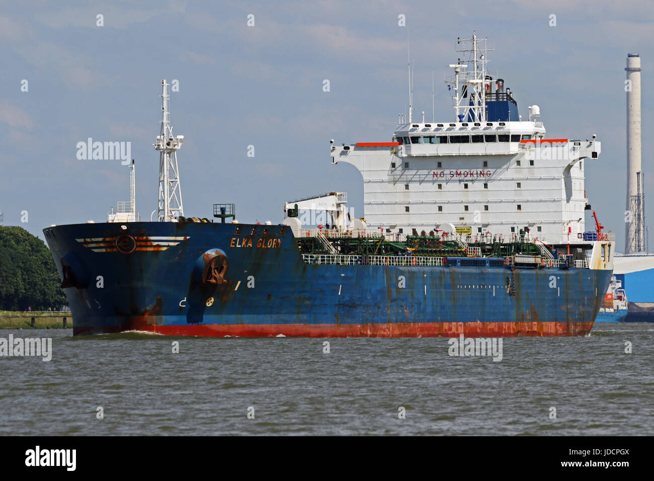 The tanker Elka Glory leaves the port of Rotterdam. Stock Photo