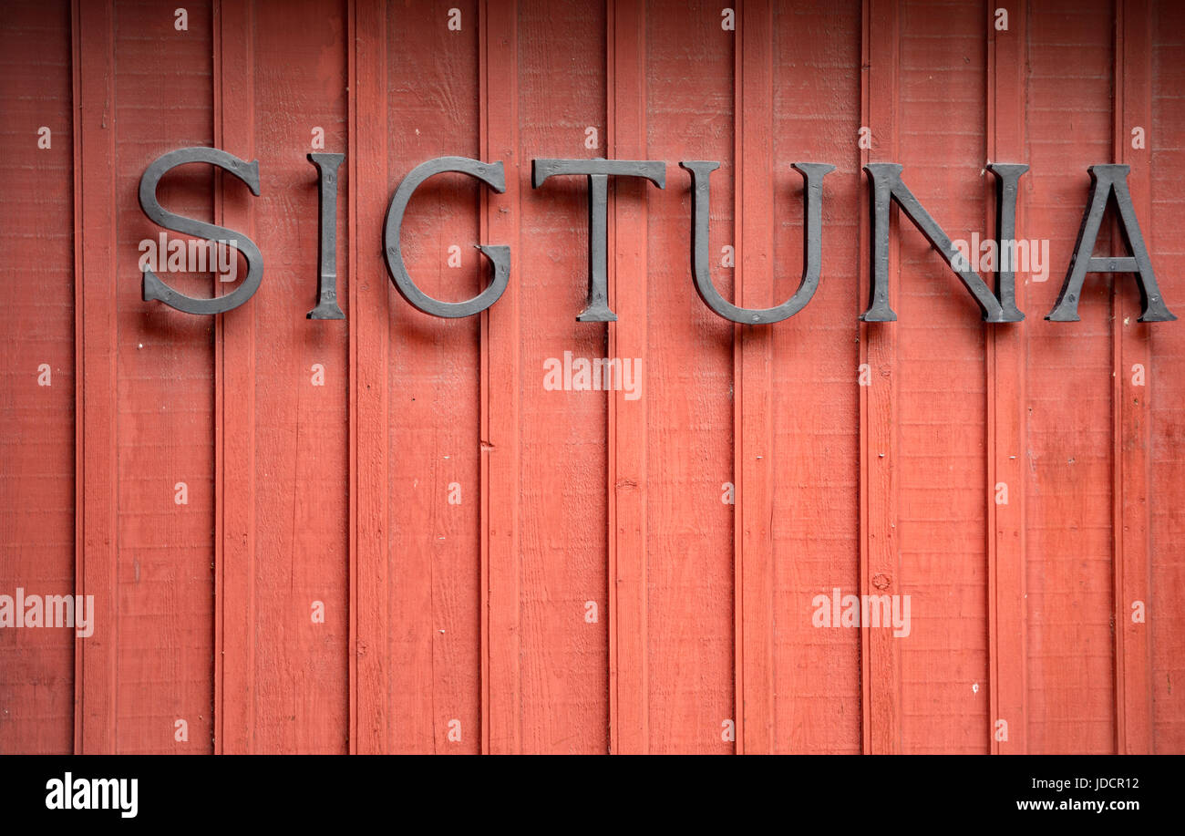 Sigtuna sign on red wooden building in Sweden, Europe, Scandinavia Stock Photo