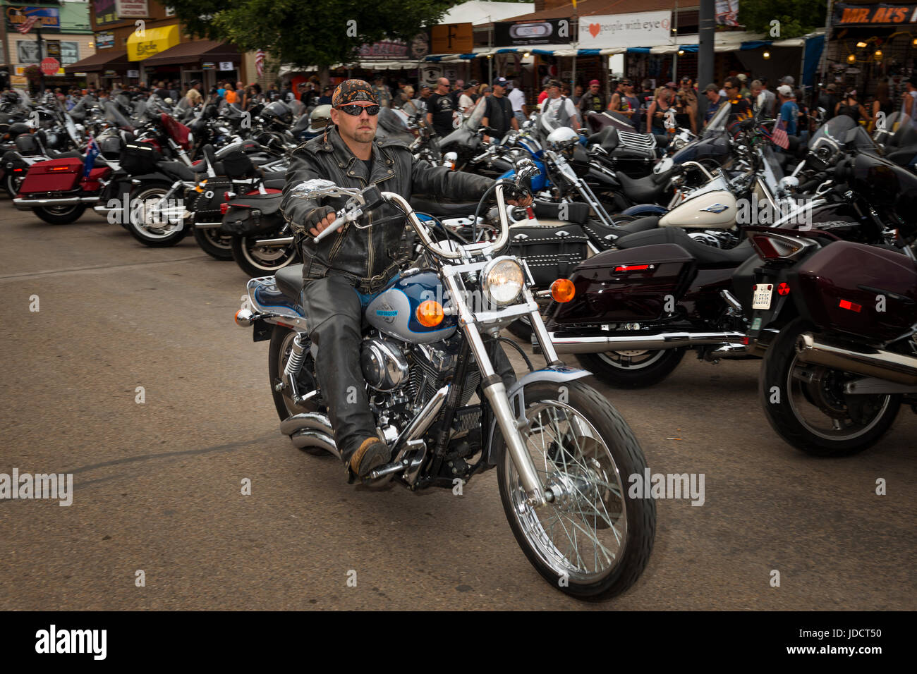Sturgis, South Dakota August 8, 2014 Rider in the main street of the