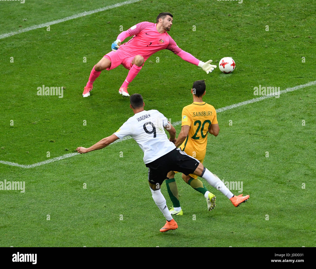 Sochi, Russia. 19th June, 2017. Australia's goalkeeper Maty Ryan (L) and teammate Trent Sainsbury (R) attempt to block a shot on goal by Germany's Sandro Wagner during the Confederations Cup group stages Group B match in the Fisht Stadium in Sochi, Russia, 19 June 2017. Photo: Marius Becker/dpa/Alamy Live News Stock Photo