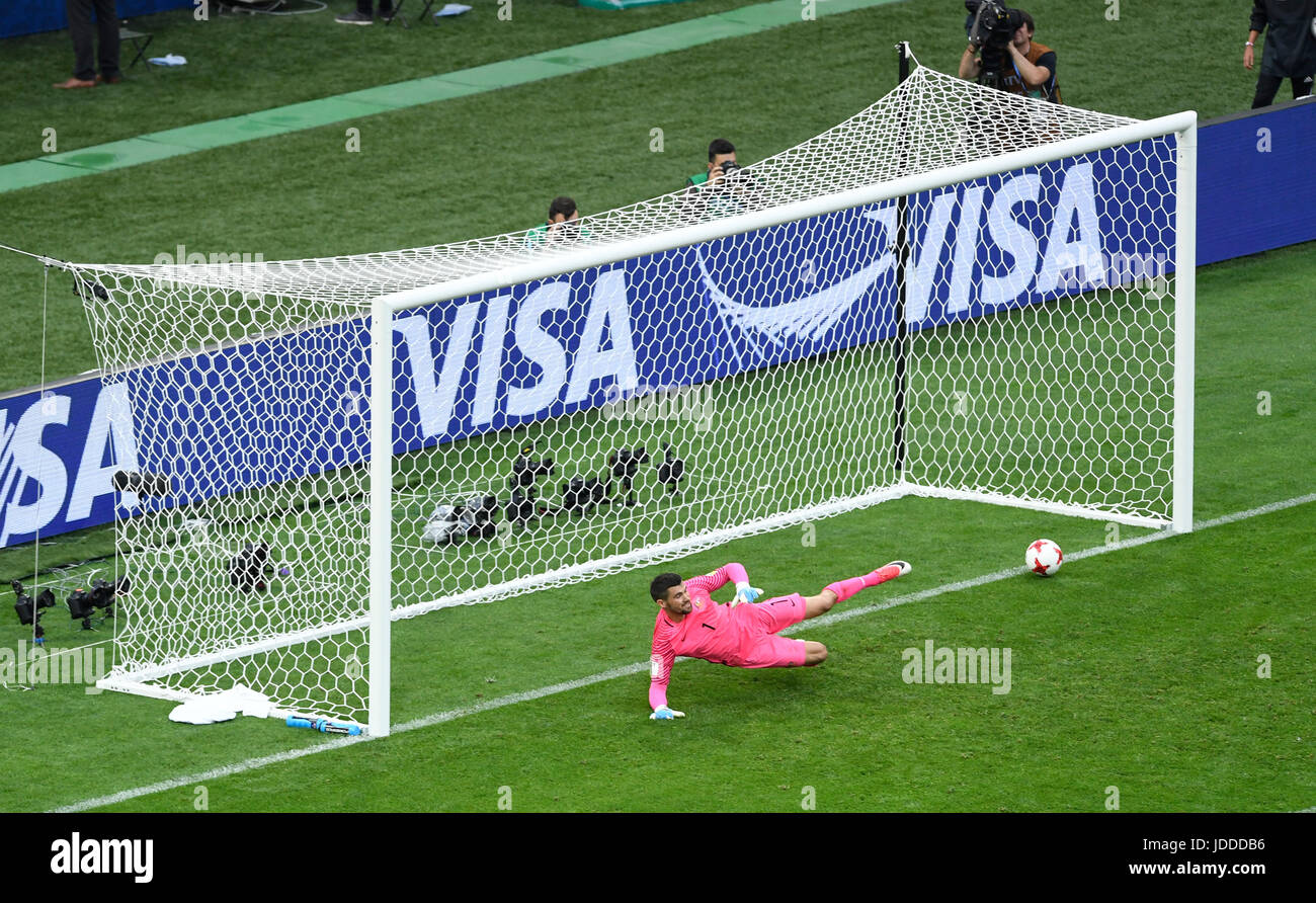 Sochi, Russia. 19th June, 2017. Australia's goalkeeper Maty Ryan fails to prevent Germany's Julian Draxler converting his penalty kick during the Confederations Cup group stages Group B match in the Fisht Stadium in Sochi, Russia, 19 June 2017. Photo: Christian Charisius/dpa/Alamy Live News Stock Photo