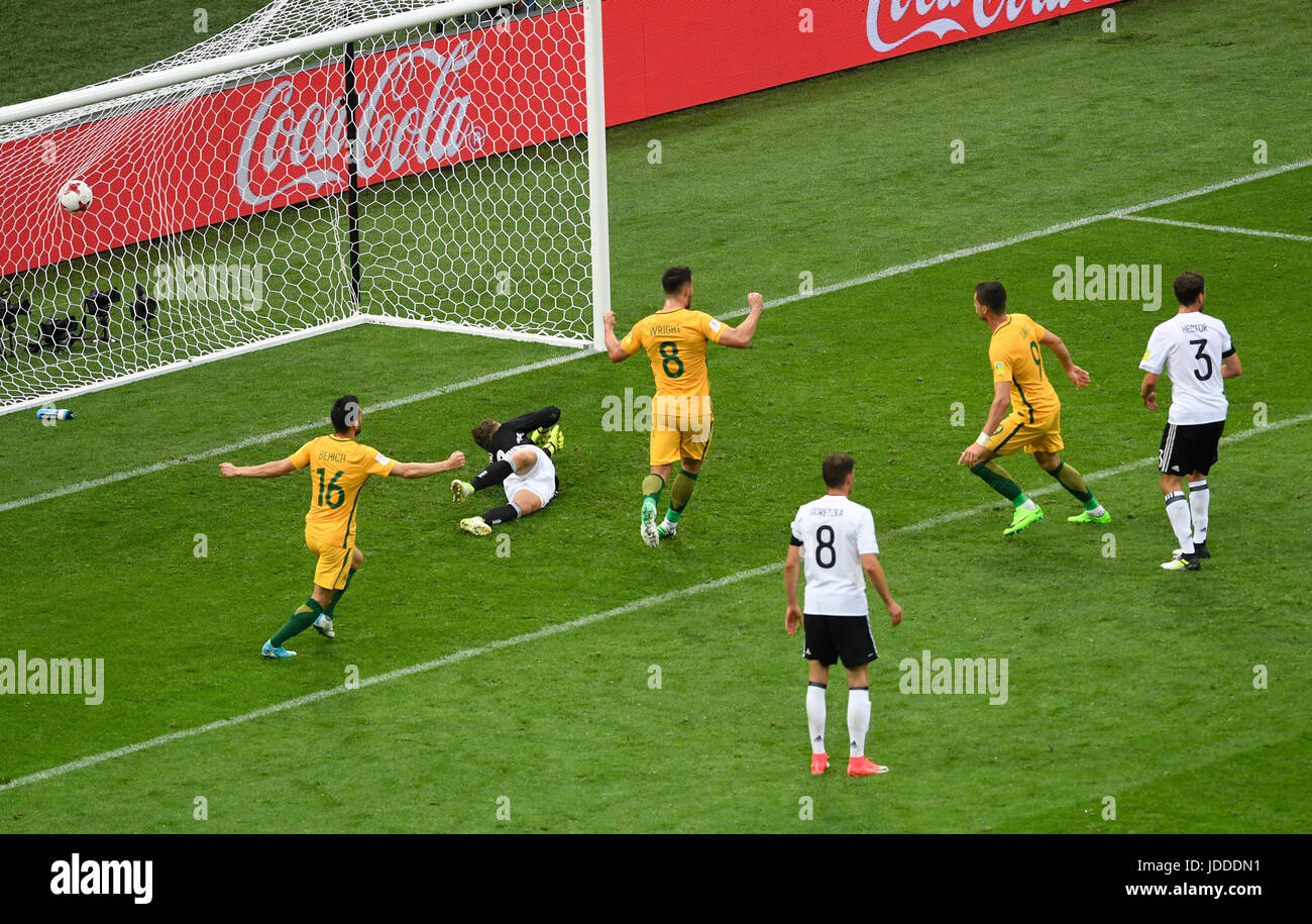Sochi, Russia. 19th June, 2017. Australia's Aziz Behich (L-R) Germany's goalkeeper Kevin Trapp, Australia's Bailey Wright, Germany's Leon Goretzka, Australia's Tomi Juric and Germany's Jonas Hector watch as the ball crosses the line to bring the score to 3:2 in Germany's favour during the Confederations Cup group stages Group B match between Australia and Germany in the Fisht Stadium in Sochi, Russia, 19 June 2017. Photo: Marius Becker/dpa/Alamy Live News Stock Photo