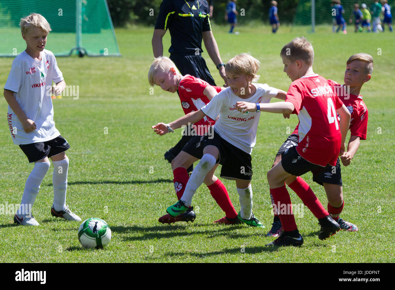 Mariehamn, Åland Islands, Finland, 19 June 2017.  Group games on day two of the Alandia Cup at Baltichallen in Mariehamn, Åland, Finland on 19 June 2017. Over 1500 players from more than 100 youth teams from across Sweden and Finland take part in the popular yearly summer football tournament in the Finnish archipelago. Pictured: EPS Akatemia Punainen (red) beat JIK/IFFK (White) 9-0 in the group stages. Picture: Rob Watkins/Alamy News Stock Photo