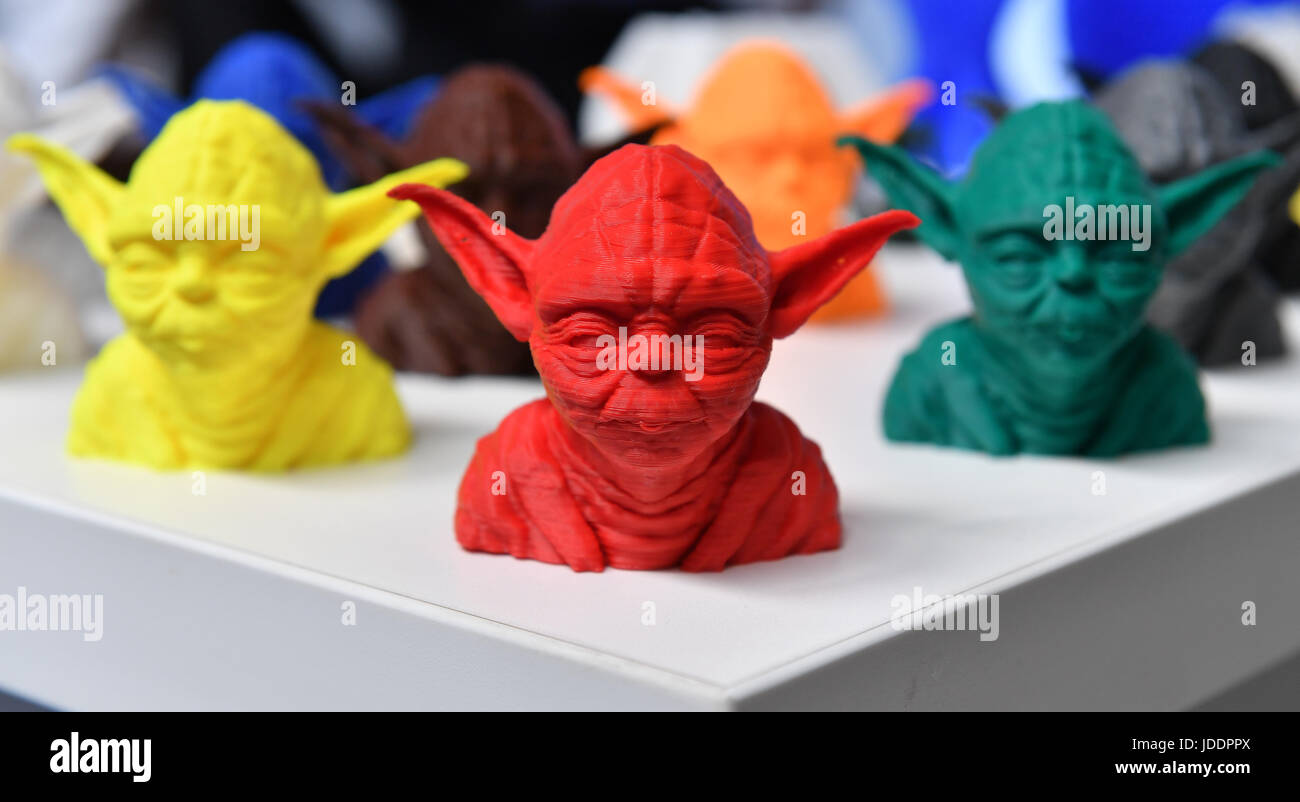 Erfurt, Germany. 20th June, 2017. 3D-printed figures of Yoda from Star Wars can be seen at the trade fair 'Rapid.Tech und FabCon 3.D 2017' in Erfurt, Germany, 20 June 2017. More than 1,100 exhibitors from 19 countries present the newest products and appliances from the areas of generative manufacturing and 3D printing. The 'Rapid.Tech' trade fair takes place from 20 to 22 June 2017 at the fair grounds in Erfurt. Photo: Martin Schutt/dpa-Zentralbild/dpa/Alamy Live News Stock Photo
