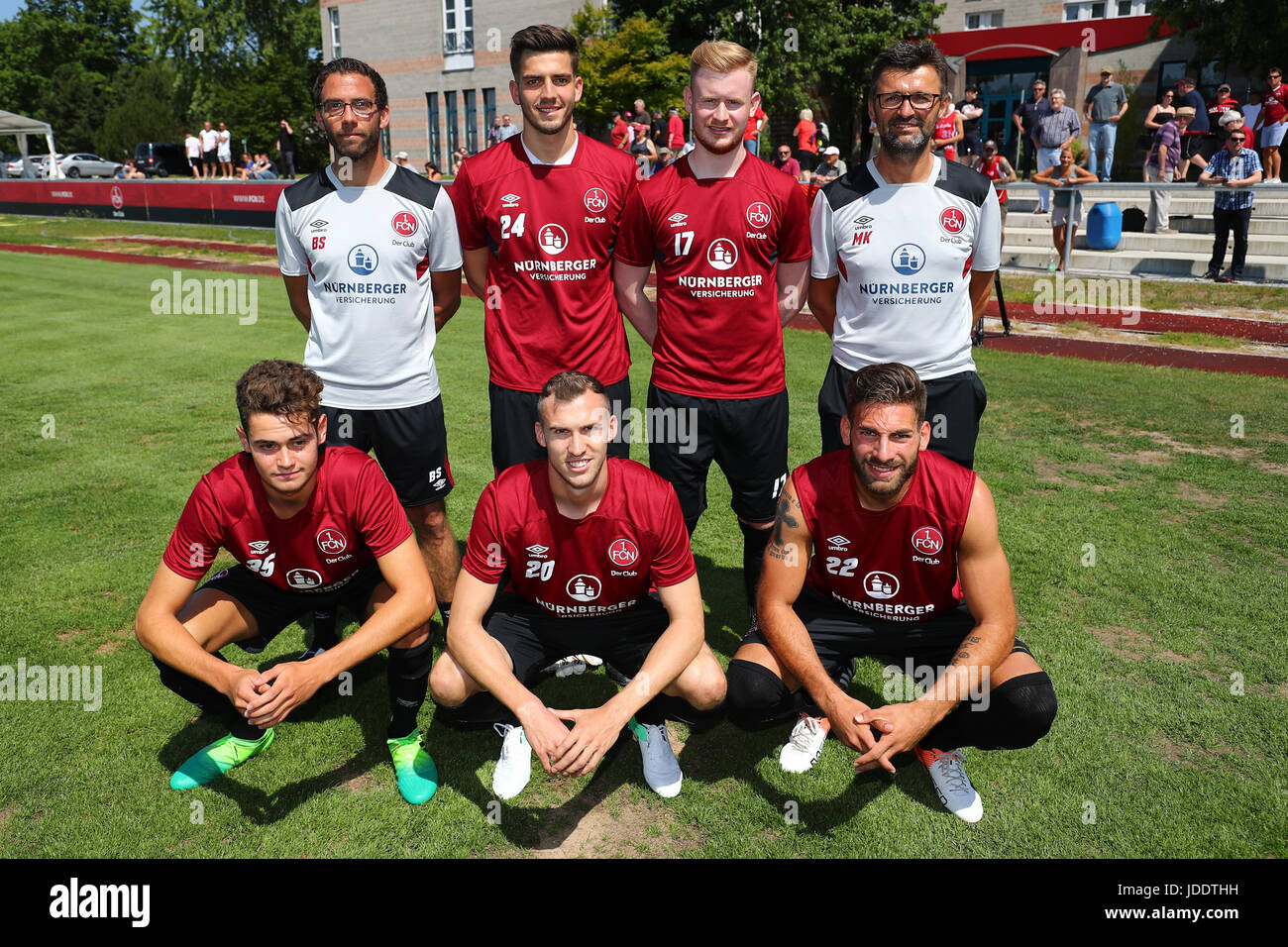 1. FC Nuremberg coach, Michael Kollner (back R), stands with new recruits, co-coach Boris Schommers (back, left to right), Fabian Bredlow, Sebastian Kerk, as well as Alexander Fuchs (front, left to right), Lukas Jager and Enrico Valentini during the Club's kick-off of training at the Max Morlock Square in Nuremberg, Germany, 20 June 2017. Photo: Daniel Karmann/dpa Stock Photo