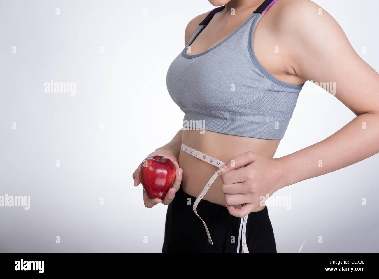 beautiful girl exercising Use the waist tape measure to check your waist  circumference during daily exercise. 11129242 Stock Photo at Vecteezy
