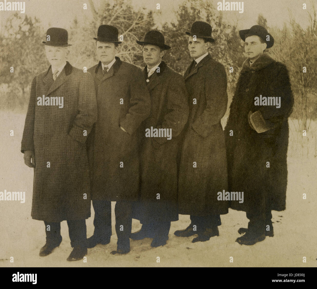 Antique c19105 photograph, five men in winter coats and jackets. Location is probably Mankato, Minnesota. SOURCE: ORIGINAL PHOTOGRAPH. Stock Photo