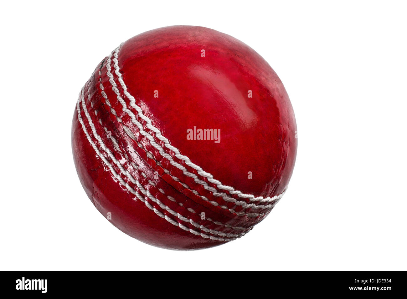 red cricket ball isolated on white Stock Photo