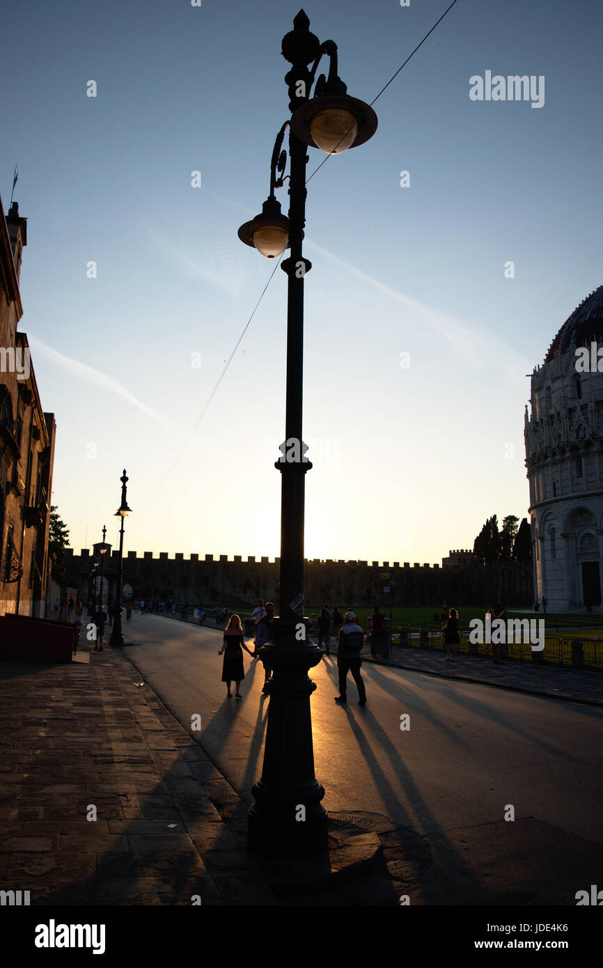 Hiding from the last sun, Pisa. Stock Photo