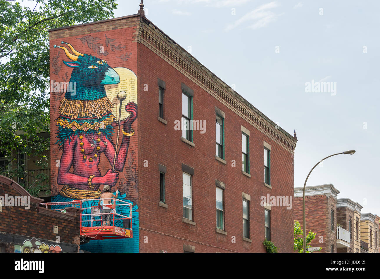 Montreal, 17 June 2017 Artist Sbu One is painting a Mural during