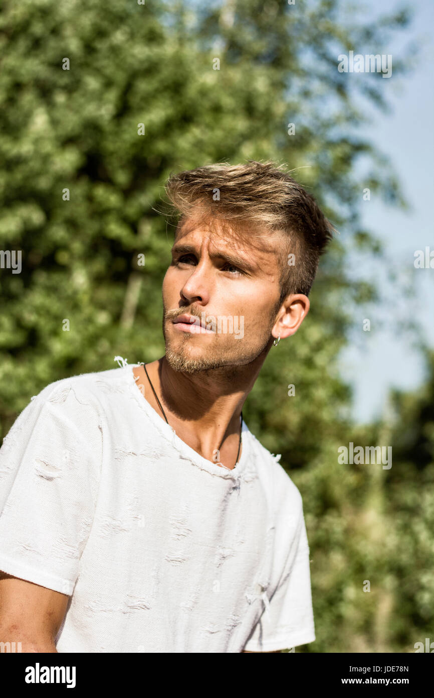 Blond hair blue green eyes man hi-res stock photography and images - Alamy